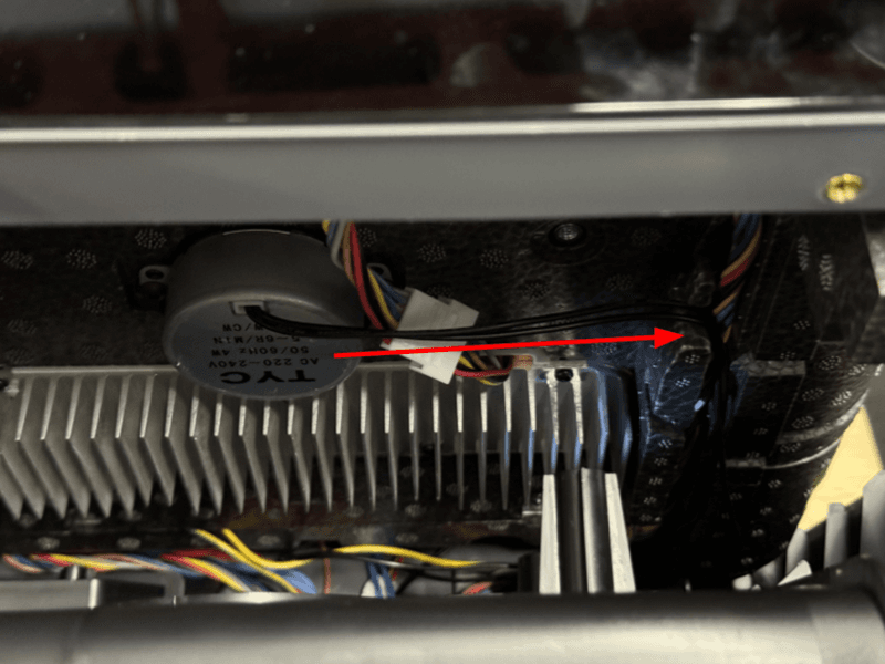 Gently pull the bottom shell away from the machine to access the insulation below.