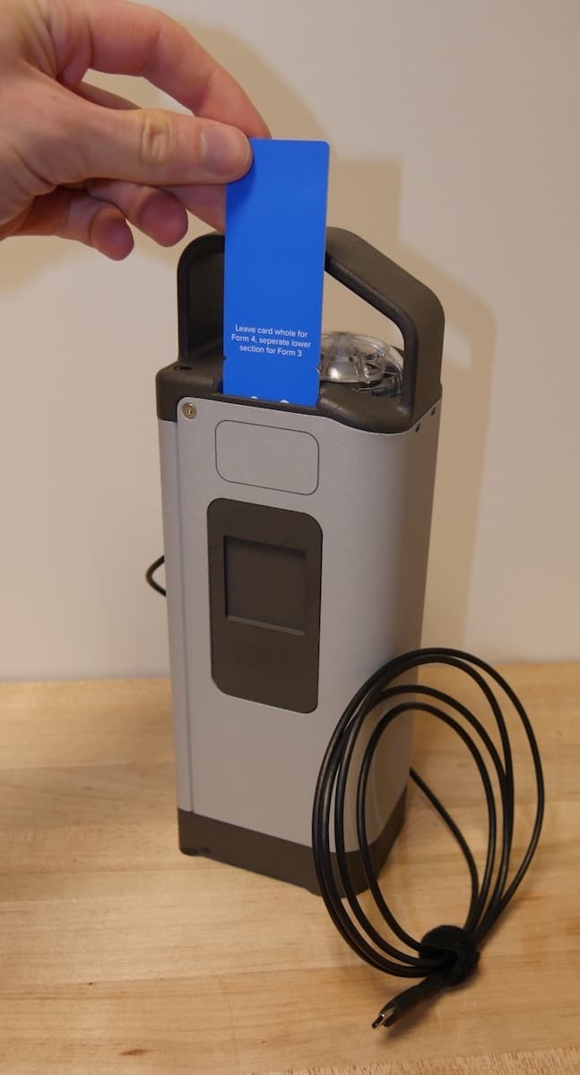 Inserting the resin card into the Resin Pumping System (Form 4)