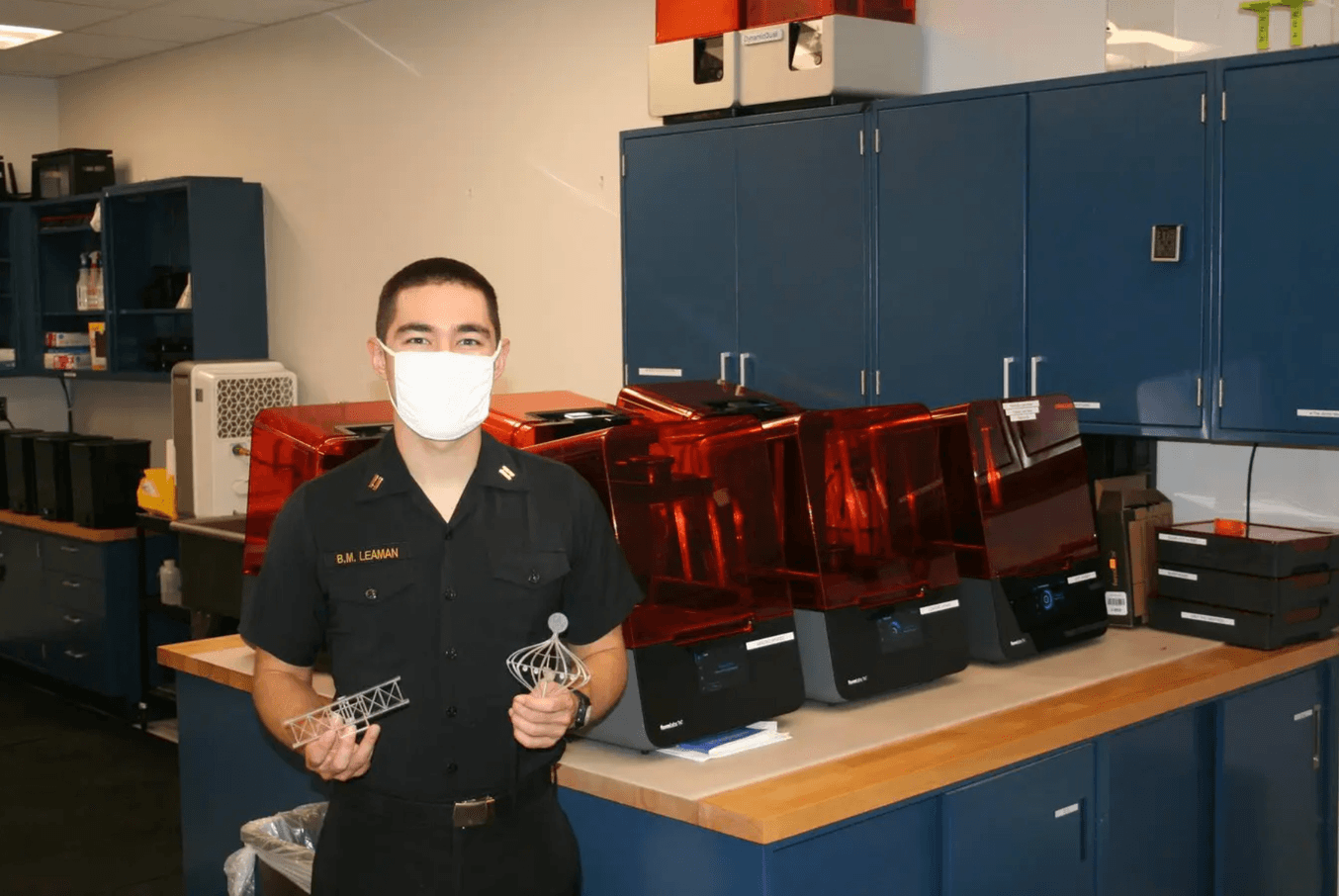 A Person Standing next to Formlabs Printers at MakerSpaceUSNA